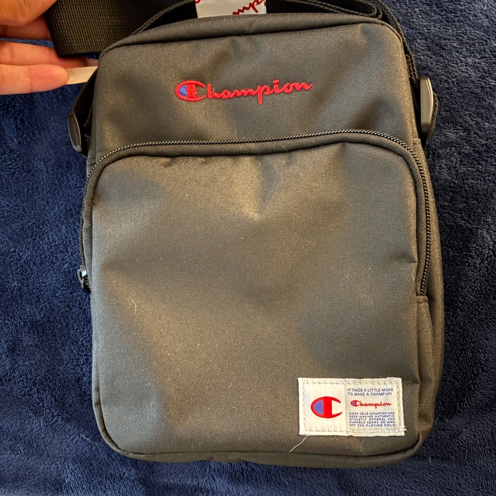 Champion Black Messenger Bag with Durable Design